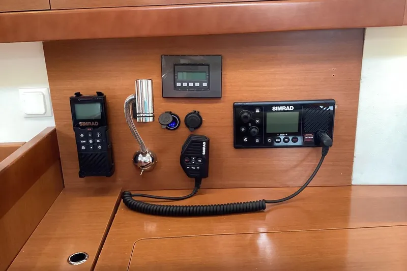 At Last Yacht Photos Pics Control panel of a 2012 Beneteau Oceanis 45 yacht with Simrad equipment.