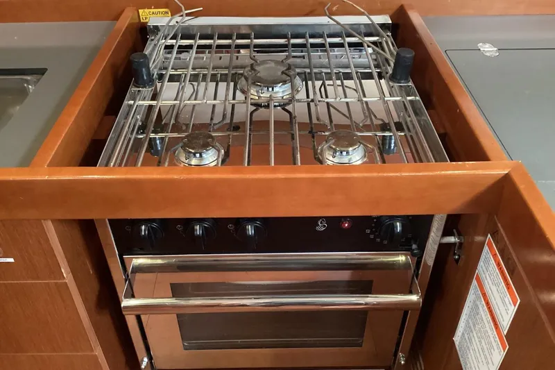 At Last Yacht Photos Pics Stove and oven in 2012 Beneteau Oceanis 45 yacht kitchen.