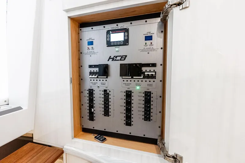  Yacht Photos Pics Electrical panel of 2025 HCB 56 Suenos GIX boat, showcasing control switches and indicators.