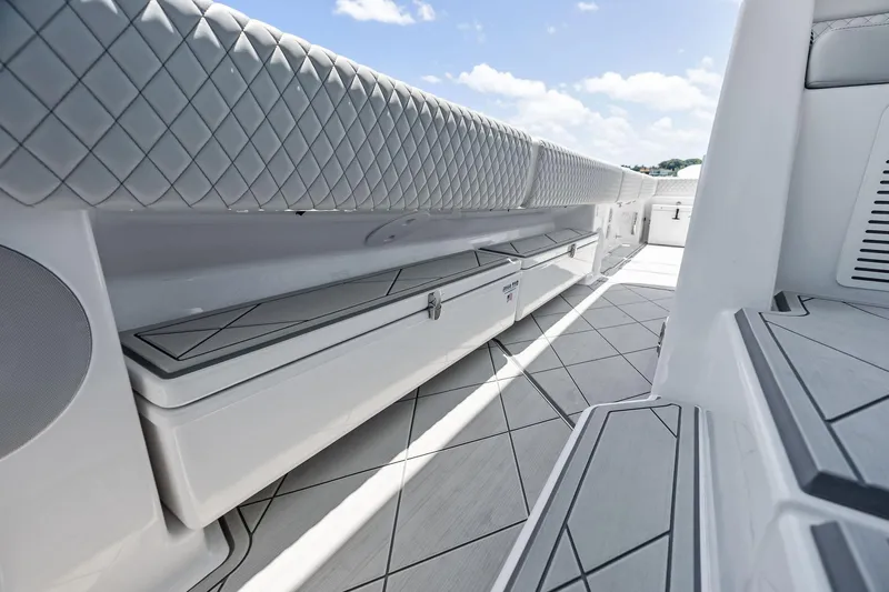  Yacht Photos Pics 2025 HCB 56 Suenos GIX boat interior with sleek seating and storage.