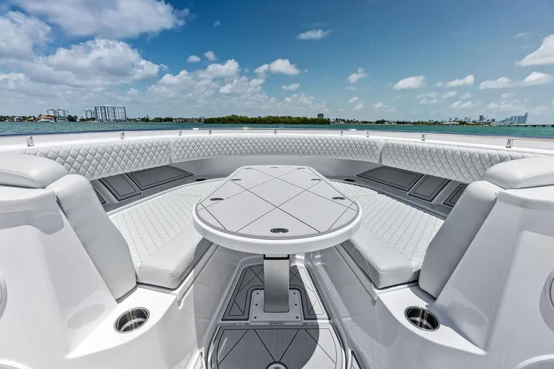  Yacht Photos Pics Luxurious seating area on 2025 HCB 56 Suenos GIX yacht, featuring elegant white upholstery.