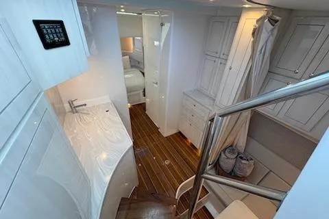  Yacht Photos Pics Luxurious interior of 2025 HCB 56 Suenos GIX yacht with modern design and wood flooring.