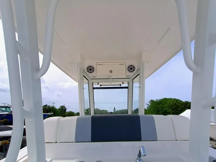 270-152 Yacht Photos Pics 2025 Robalo R270 Center Console boat interior with seating and overhead speakers.