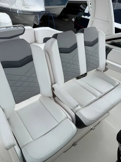  Yacht Photos Pics 2020 Chaparral 300 OSX boat seats, featuring modern gray and white upholstery.