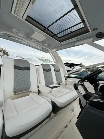  Yacht Photos Pics 2020 Chaparral 300 OSX boat interior with luxurious seating and modern design.