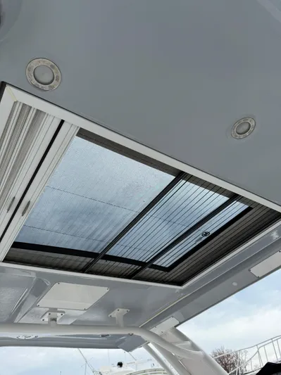  Yacht Photos Pics 2020 Chaparral 300 OSX boat sunroof with sleek design and integrated lighting.