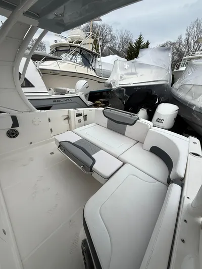  Yacht Photos Pics 2020 Chaparral 300 OSX boat interior with white seating and sleek design.