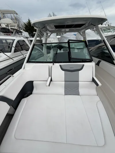  Yacht Photos Pics 2020 Chaparral 300 OSX boat with spacious seating and sleek design.