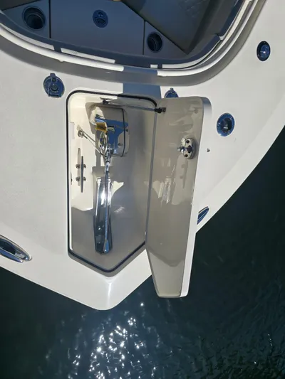  Yacht Photos Pics 2024 Scout 355 LXF boat anchor compartment, open hatch, viewed from above.