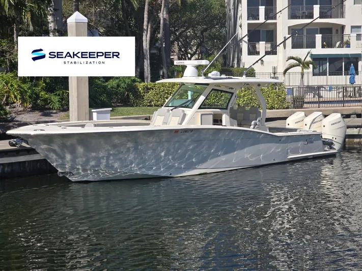  Yacht Photos Pics 2024 Scout 355 LXF boat docked with Seakeeper stabilization system.