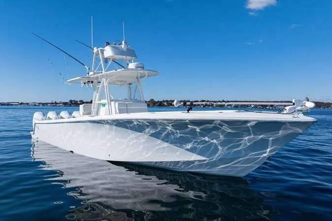  Yacht Photos Pics 2016 SeaVee 390Z boat on calm water under clear blue sky.