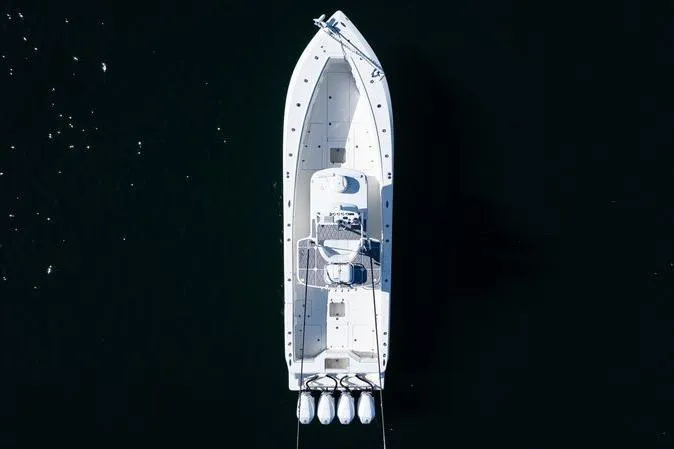  Yacht Photos Pics Overhead view of 2016 SeaVee 390Z boat on dark water.