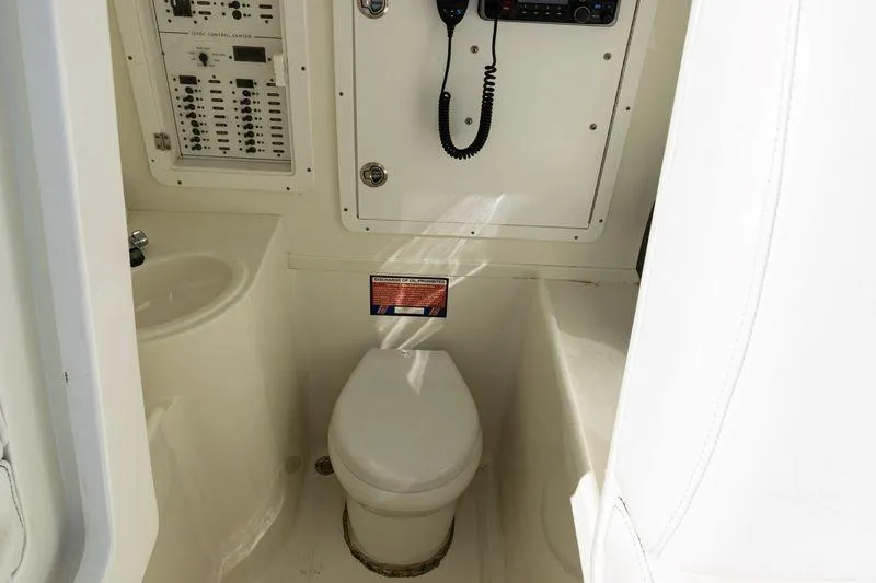  Yacht Photos Pics 2016 SeaVee 390Z boat interior with toilet and control panel.