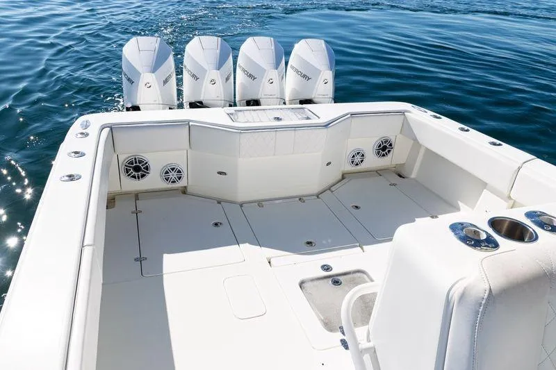  Yacht Photos Pics 2016 SeaVee 390Z boat with four Mercury engines on calm water.