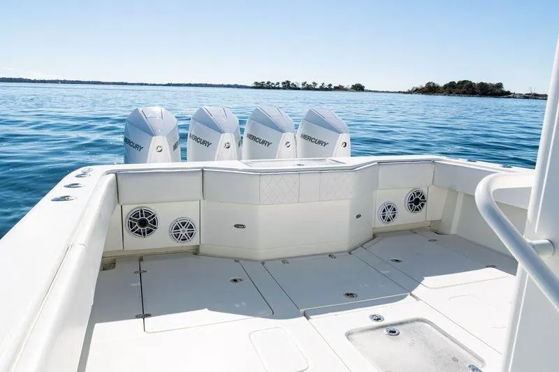  Yacht Photos Pics 2016 SeaVee 390Z boat with four Mercury engines on calm water.