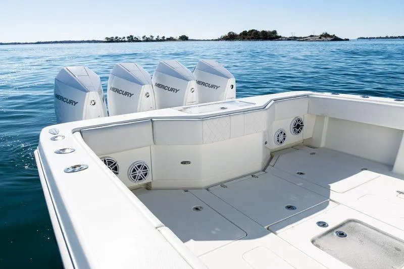  Yacht Photos Pics 2016 SeaVee 390Z boat with four Mercury engines on calm water.