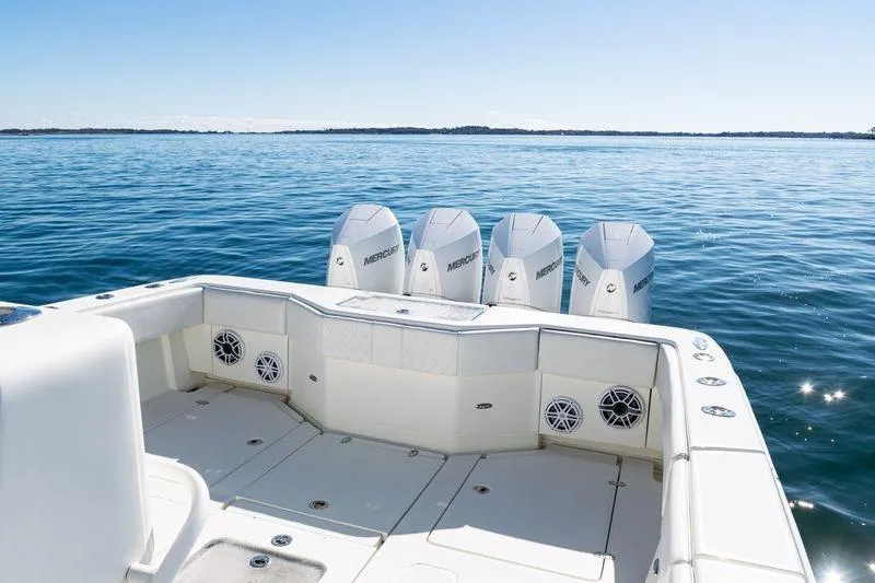  Yacht Photos Pics 2016 SeaVee 390Z boat with four Mercury engines on calm water.