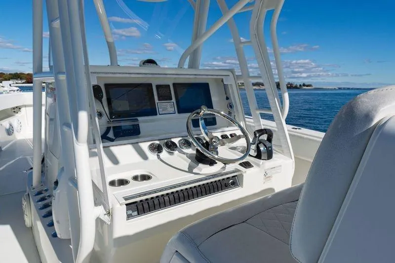  Yacht Photos Pics 2016 SeaVee 390Z boat helm with modern controls and ocean view.