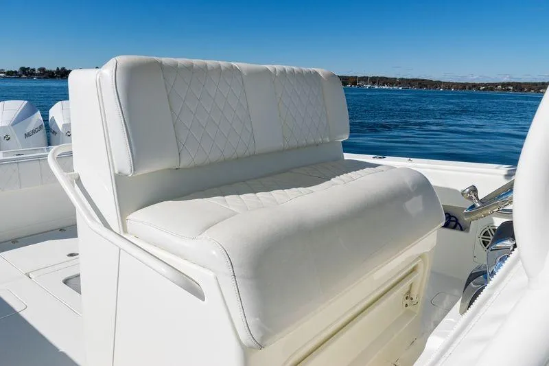  Yacht Photos Pics Luxurious seating on 2016 SeaVee 390Z boat with ocean backdrop.