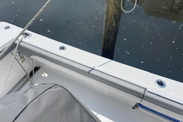  Yacht Photos Pics 2024 Regulator 28 boat deck with ropes and water view.