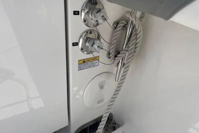  Yacht Photos Pics 2024 Regulator 28 boat cleat with ropes and fuel connectors.