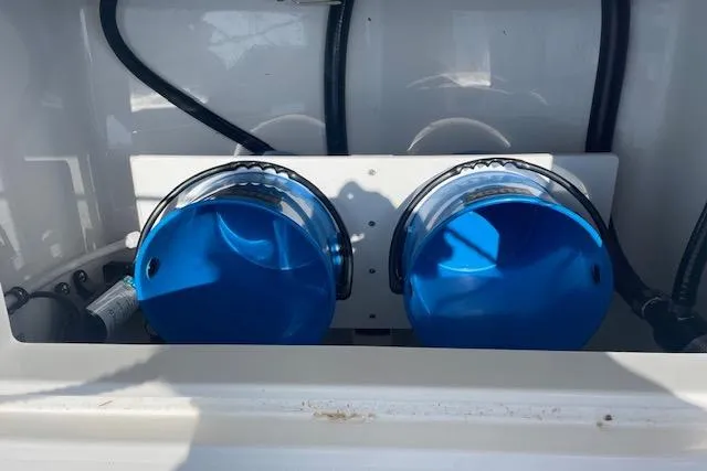  Yacht Photos Pics 2024 Regulator 28 boat with dual blue fuel filters in the engine compartment.