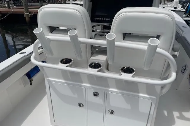  Yacht Photos Pics 2024 Regulator 28 boat with rod holders and storage compartments.