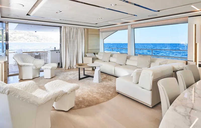 Nadira Yacht Photos Pics Luxurious interior of 2019 Princess 30M yacht with ocean view and elegant white furnishings.