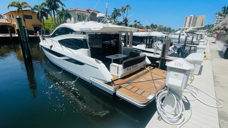 Keep Paddlin' Yacht Photos Pics Galeon 430 HTC 2019 yacht docked on a sunny day.