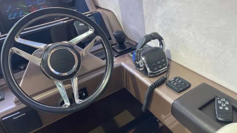 Keep Paddlin' Yacht Photos Pics Steering console of the 2019 Galeon 430 HTC yacht.