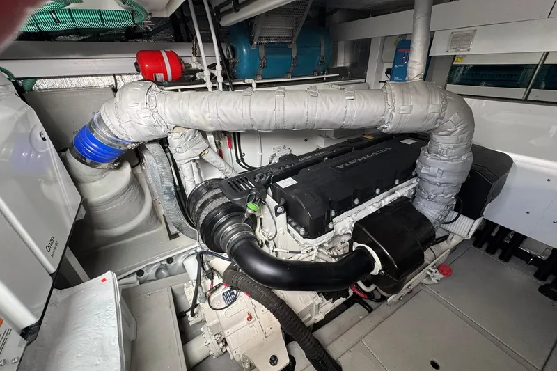  Yacht Photos Pics Engine room of 2022 Sunseeker Manhattan 55 yacht, featuring Volvo Penta engine and Onan generator.