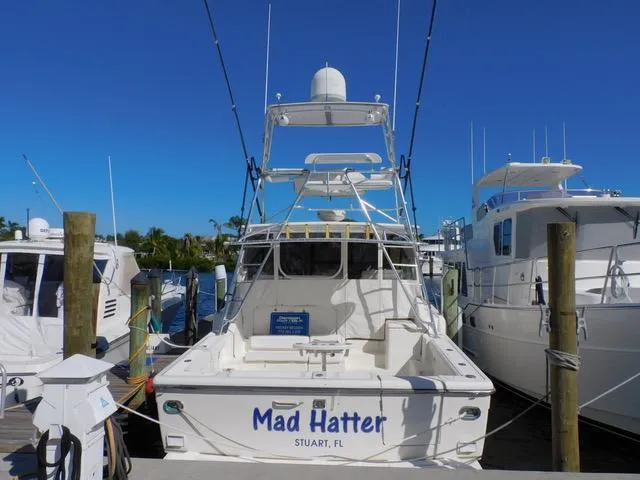 Mad Hatter Yacht Photos Pics 1997 Tiara Yachts Open boat named "Mad Hatter" docked in Stuart, FL.