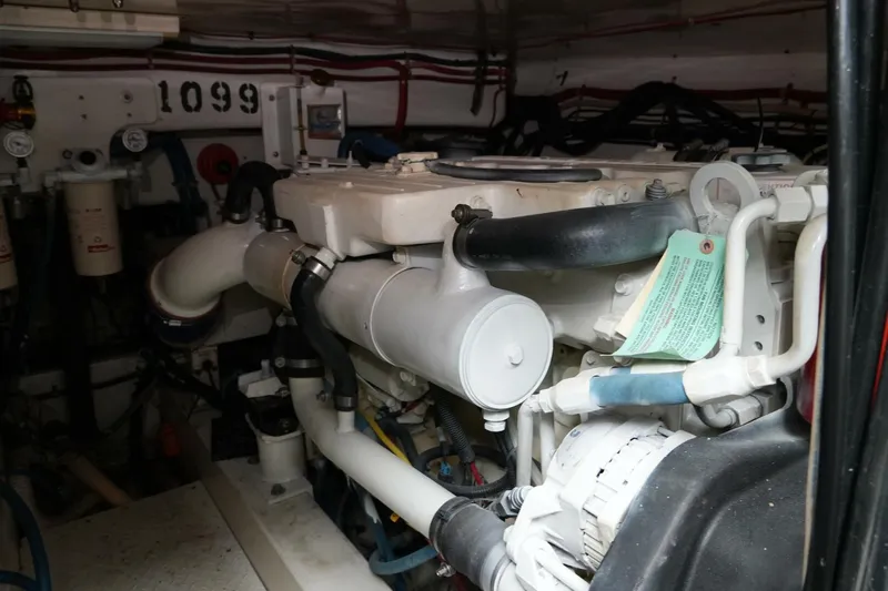 R & R Yacht Photos Pics Engine room of a 2000 Stolper 3800 Tournament Express boat, showcasing mechanical components.