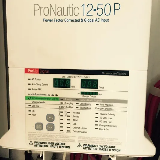 R & R Yacht Photos Pics ProNautic 12:50 P battery charger display on Stolper 3800 Tournament Express, 2000 model.