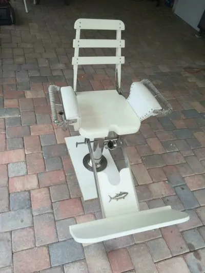 R & R Yacht Photos Pics Fishing chair on brick patio, Stolper 3800 Tournament Express, 2000 model.