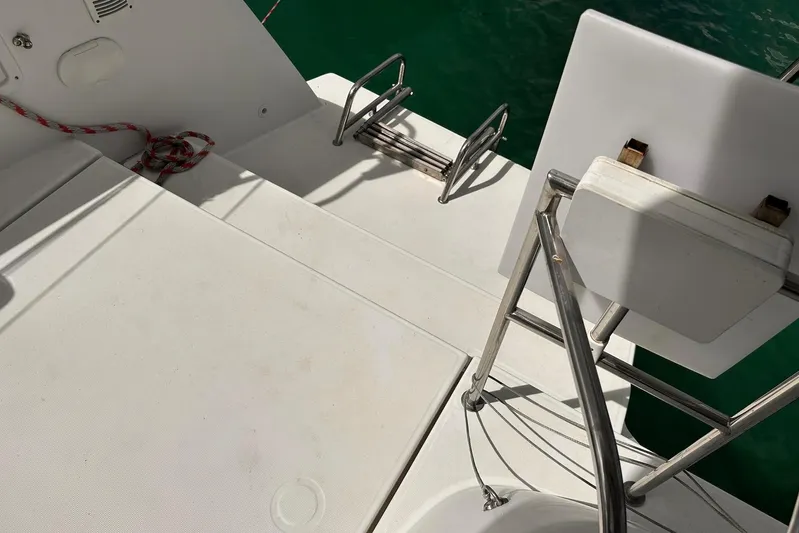  Yacht Photos Pics Deck of a 2016 Lagoon 42 catamaran with stainless steel railings and steps.