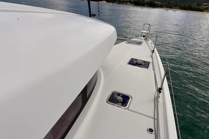 Yacht Photos Pics 2016 Lagoon 42 catamaran deck with ocean view and sleek design.