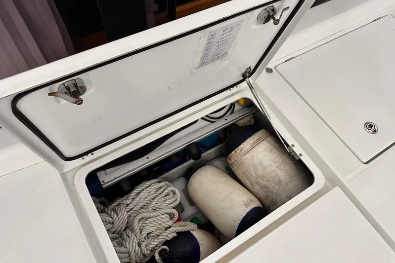  Yacht Photos Pics Storage compartment on a 2016 Lagoon 42 boat with ropes and fenders.