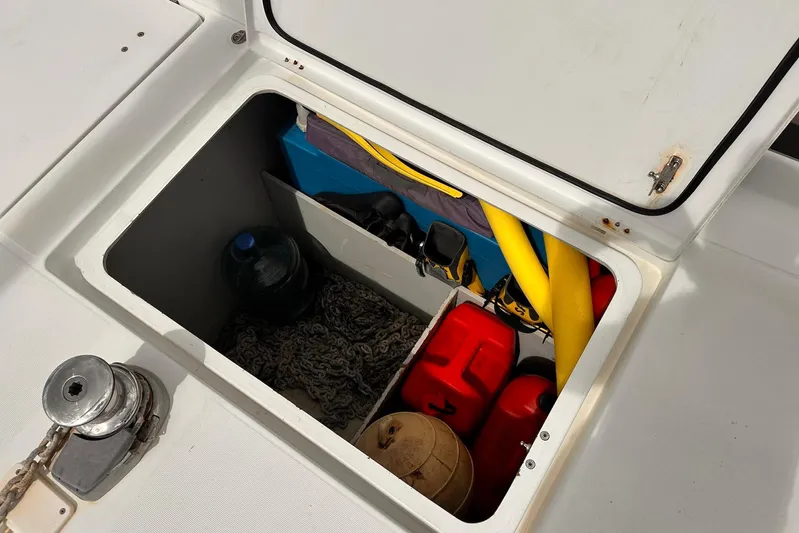  Yacht Photos Pics Storage compartment on a 2016 Lagoon 42 catamaran with various equipment and supplies.