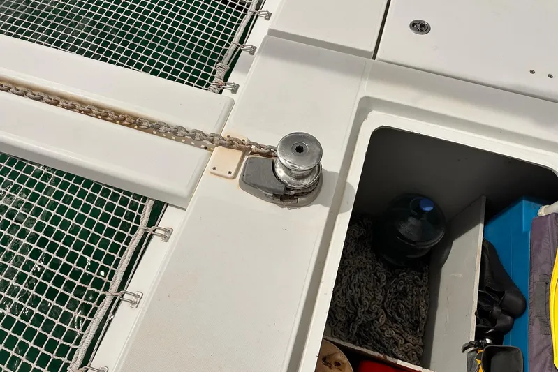  Yacht Photos Pics Anchor chain and storage compartment on a 2016 Lagoon 42 catamaran deck.