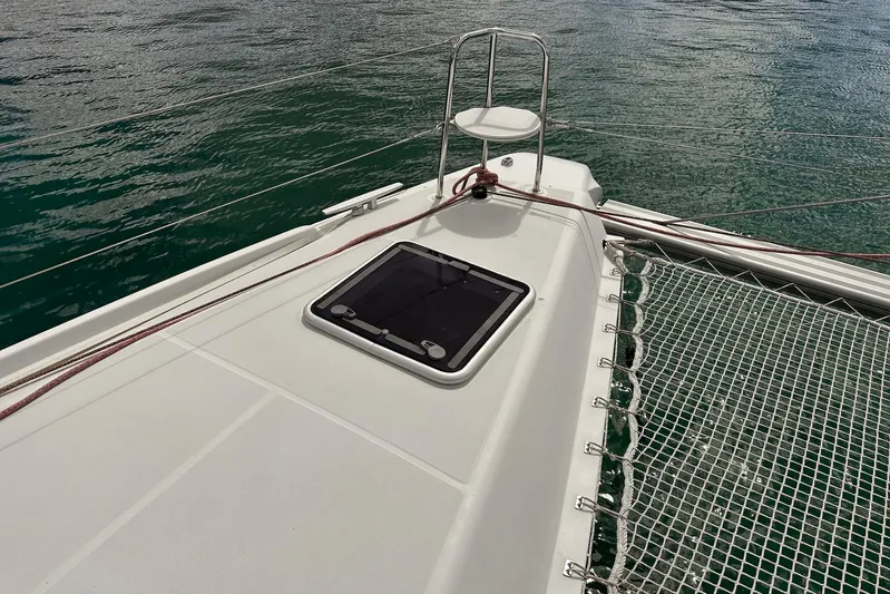  Yacht Photos Pics Deck of 2016 Lagoon 42 catamaran with netting and ocean view.