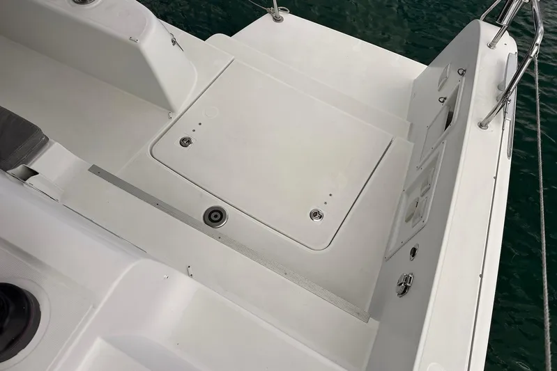  Yacht Photos Pics Deck of 2016 Lagoon 42 catamaran with clean, white surface and water view.