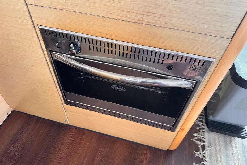  Yacht Photos Pics Built-in oven on 2016 Lagoon 42 yacht with wooden cabinetry.