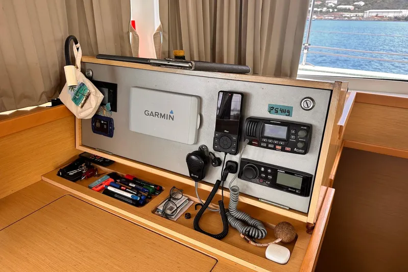  Yacht Photos Pics Navigation equipment on a 2016 Lagoon 42 catamaran, featuring Garmin and communication devices.