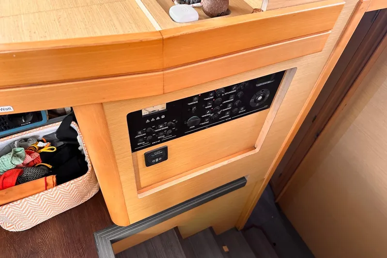  Yacht Photos Pics Control panel on a 2016 Lagoon 42 yacht, with storage basket nearby.