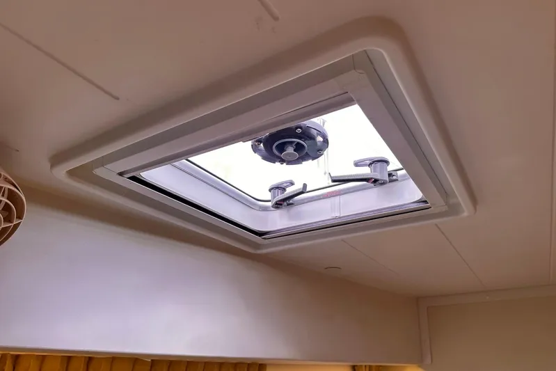  Yacht Photos Pics Ceiling hatch of 2016 Lagoon 42 catamaran, interior view.