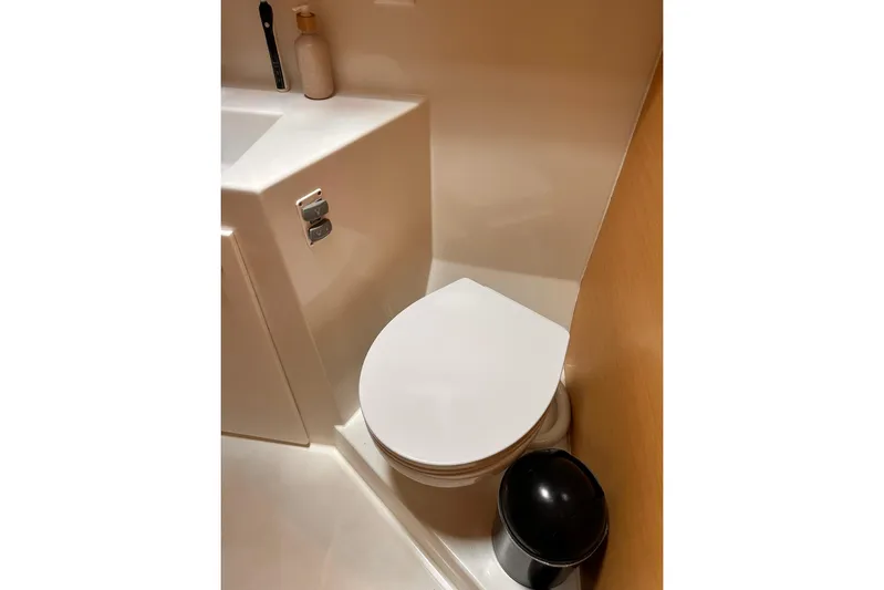  Yacht Photos Pics Compact bathroom in 2016 Lagoon 42 yacht with modern fixtures.