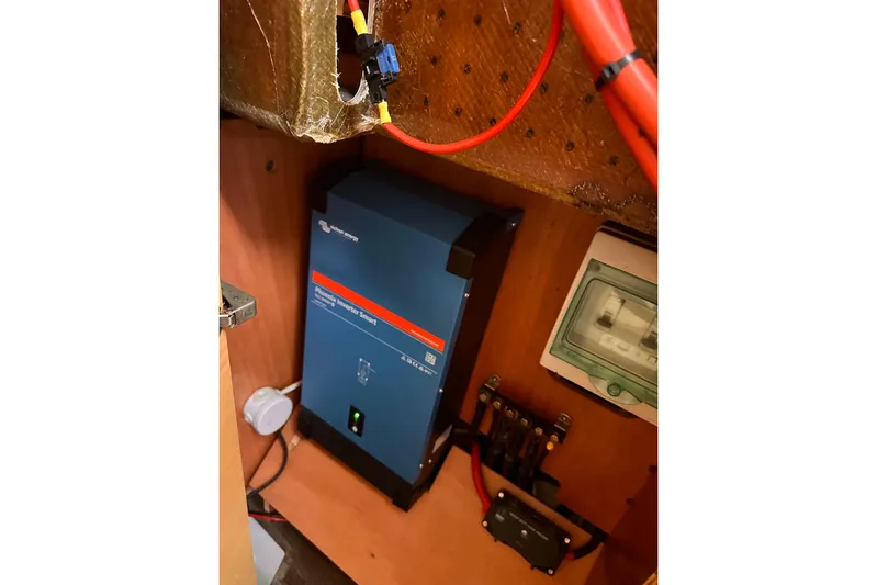 Yacht Photos Pics Electrical system inside a 2016 Lagoon 42 yacht, featuring a Victron inverter.