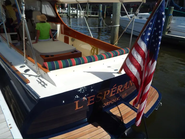  Yacht Photos Pics Hinckley Classic 36 Picnic Boat, 2001, docked with American flag, Norfolk, VA.