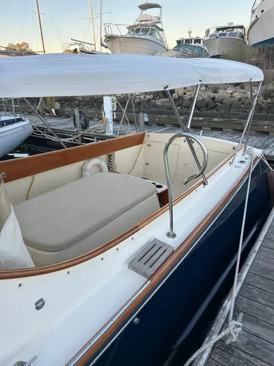  Yacht Photos Pics 2001 Hinckley Classic 36 Picnic Boat docked, featuring elegant design and spacious seating.
